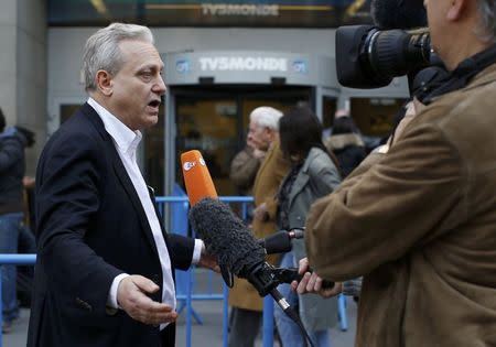 French television network TV5Monde director Yves Bigot answers journalists questions in front of their headquarters in Paris April 9, 2015. REUTERS/Benoit Tessier