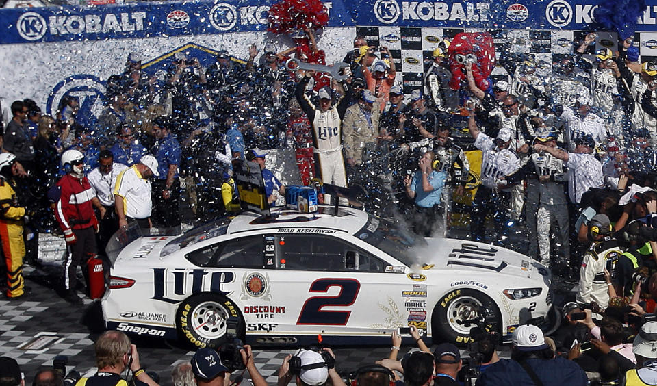 Brad Keselowski celebrates in victory lane after winning a NASCAR Sprint Cup Series auto race, Sunday, March 9, 2014, in Las Vegas. (AP Photo/Isaac Brekken)