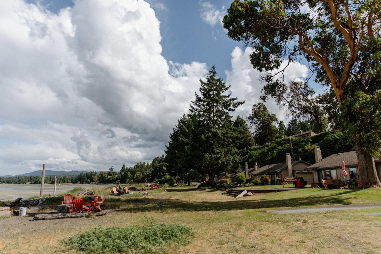 William Christensen says if exemptions fail to be made for strata hotels and motels at Parksville's Resort Drive, it would be the end of his business and those of many other residents.  (Submitted by Beach Acres Resort - image credit)