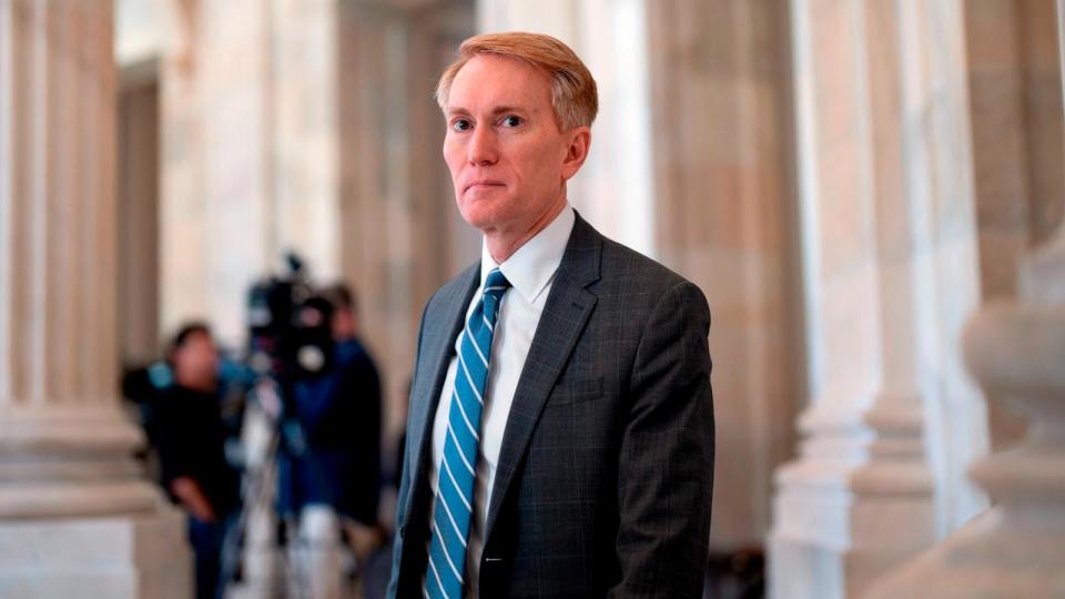 PHOTO: Sen. James Lankford, R-Okla., the lead GOP negotiator on the Senate border and foreign aid package, does a TV news interview at the Capitol in Washington, Feb. 5, 2024. (J. Scott Applewhite/AP)