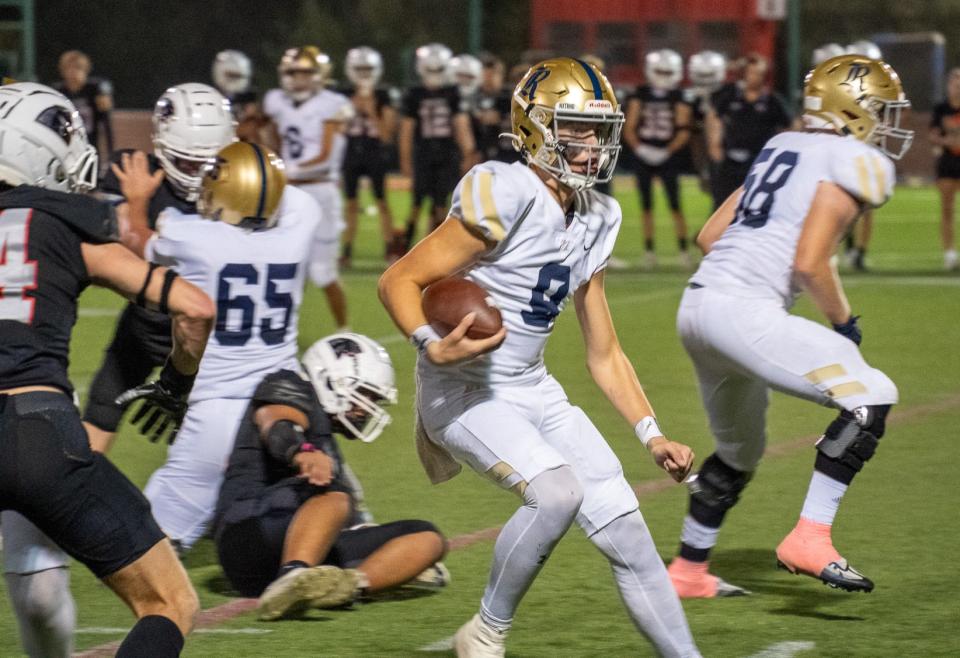 Regents quarterback Quinn Murphy scrambles for some yards during the Knights 50-14 win over Hyde Park on Oct. 13. Regents will play in the TAPPS Division II state title game Friday in Waco.