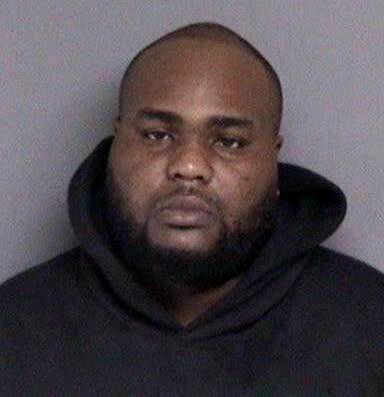 Sebron Russell is seen in a mugshot released by the Alameda County Sheriff’s Office.