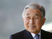 FILE PHOTO: Japan's Emperor Akihito smiles at the Imperial Palace in Tokyo February 23, 2011. REUTERS/Kim Kyung-Hoon/File Photo