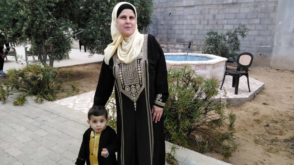 An old family photo of Hala with her grandson, Tayem, who is now 5-years-old. They were holding hands when she was shot. - Khreis Family