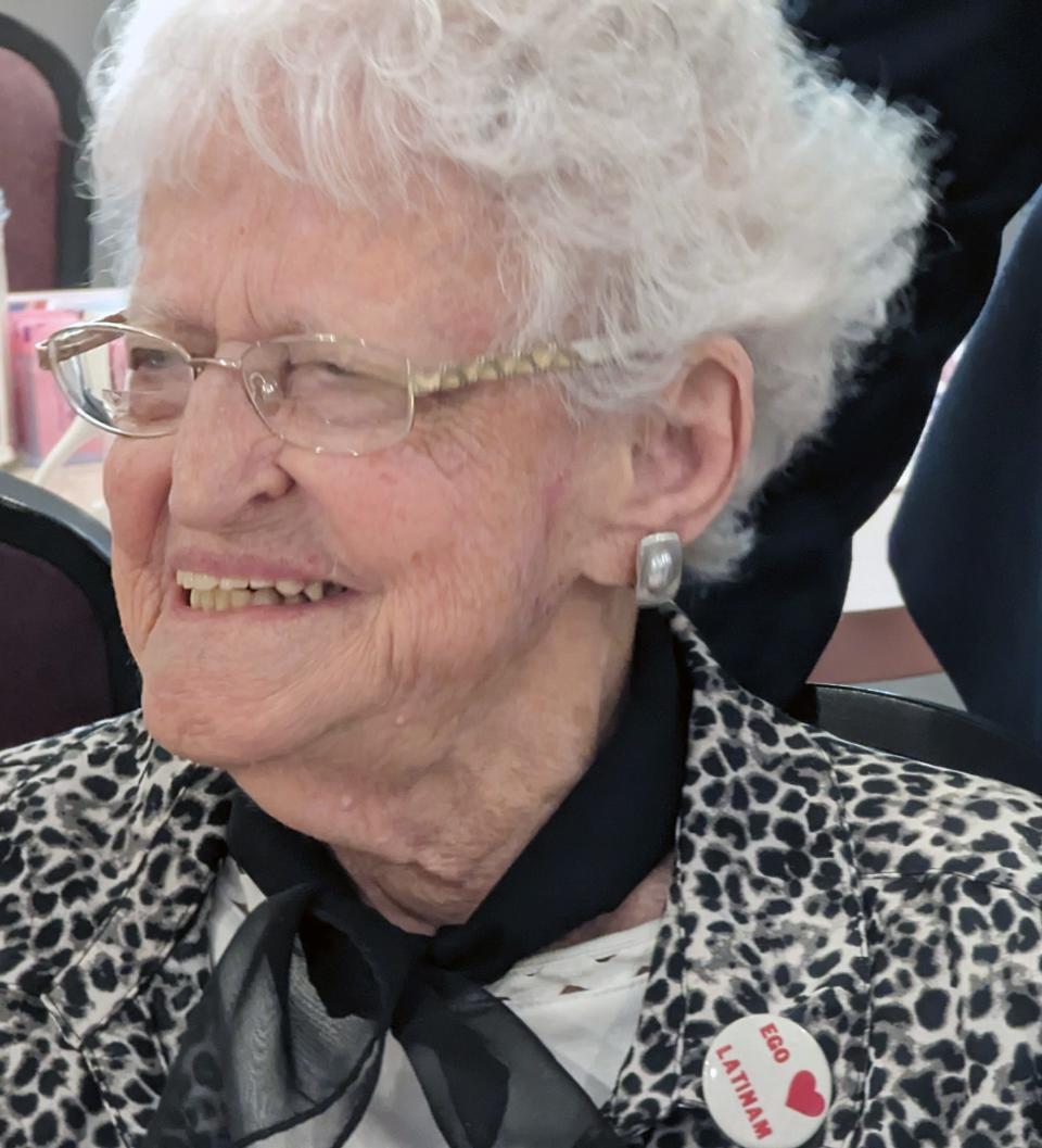 Mary Grace Holtzapple wearing her "I love Latin" button during her 105-year celebration luncheon at Village Green Family Restaurant in Springettsbury Township Thursday.