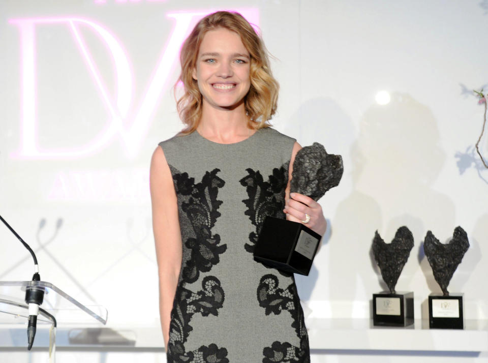 This April 5, 2013 photo released by The DVF Awards shows model Natalia Vodianova with her DVF Award in New York. Vodianova was recognized for her charity with children in her native Russia. She founded a charity called the Naked Heart Foundation in 2004. It started as a project to build a playground for the surviving children of the Beslan school massacre. Since then, it has grown to 90 play parks in 68 Russian towns. (AP Photo/The DVF Awards, Neil Rasmus)