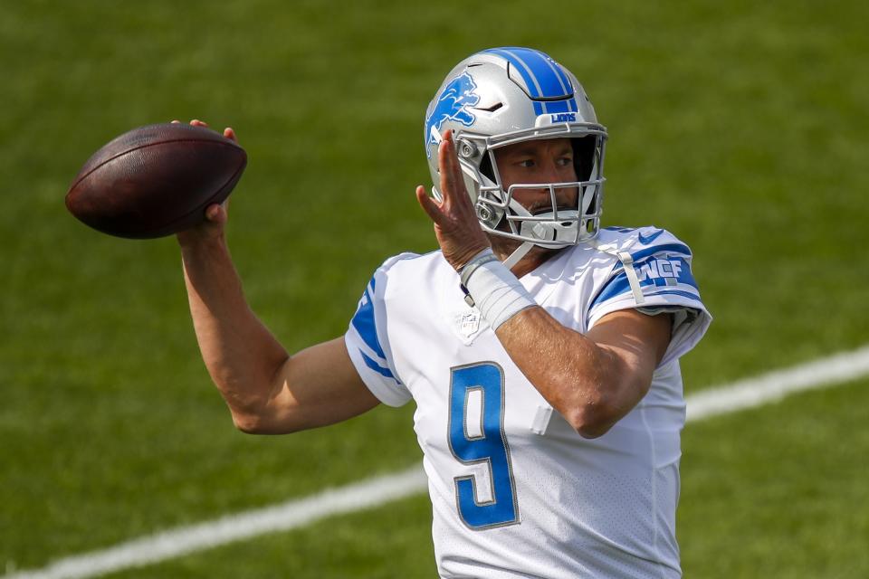Detroit Lions' Matthew Stafford warms up before an NFL football game against the Green Bay Packers Sunday, Sept. 20, 2020, in Green Bay, Wis. (AP Photo/Matt Ludtke)