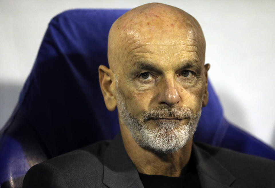 AC Milan's manager Stefano Pioli looks out from the bench before the Champions League Group E soccer match between Dinamo Zagreb and AC Milan in Zagreb, Croatia, Tuesday, Oct. 25, 2022. (AP Photo)