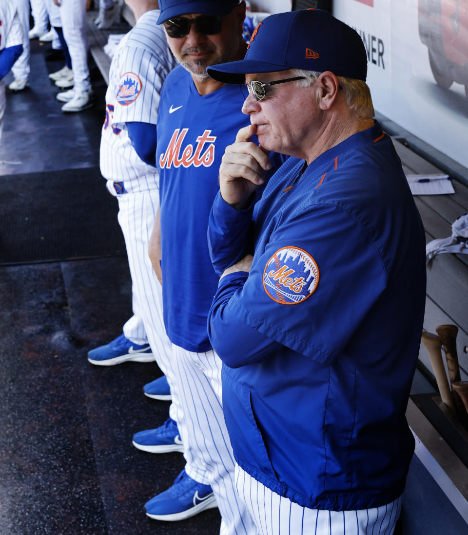 New York Mets manager Buck Showalter watches from the dugout before the start of baseball game against the Philadelphia Phillies, Sunday, Oct. 1, 2023 in New York. (AP Photo/Noah K. Murray)