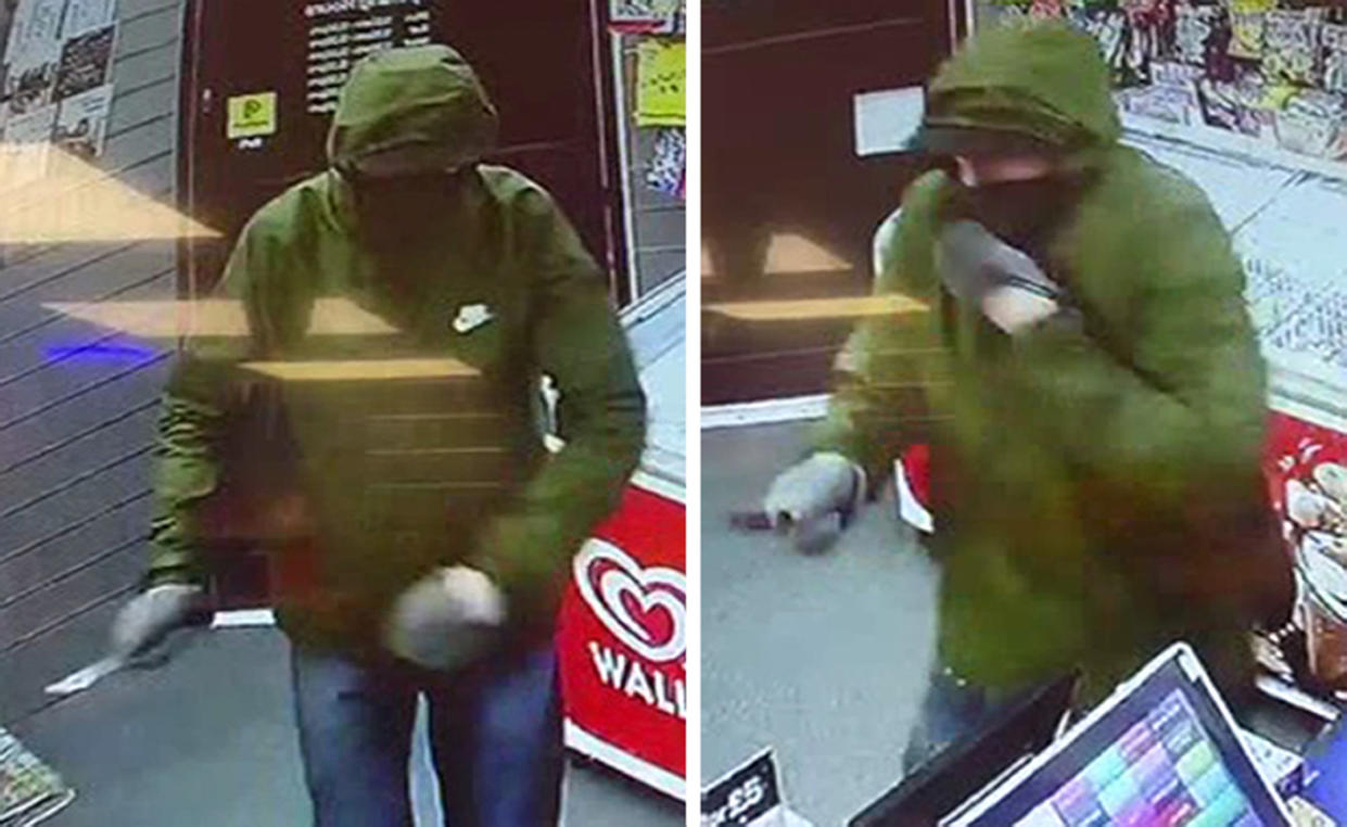 An 11-year-old girl scared off the armed robber (pictured) by throwing bread at him with her dad. (PA)