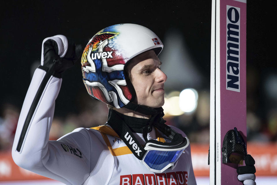 Norway's Egner Granerud waves after winning the ski jumping, men's World Cup large hill event, in Willingen, Germany, Sunday, Feb. 5, 2023. (Swen Pfoertner/dpa/dpa via AP)