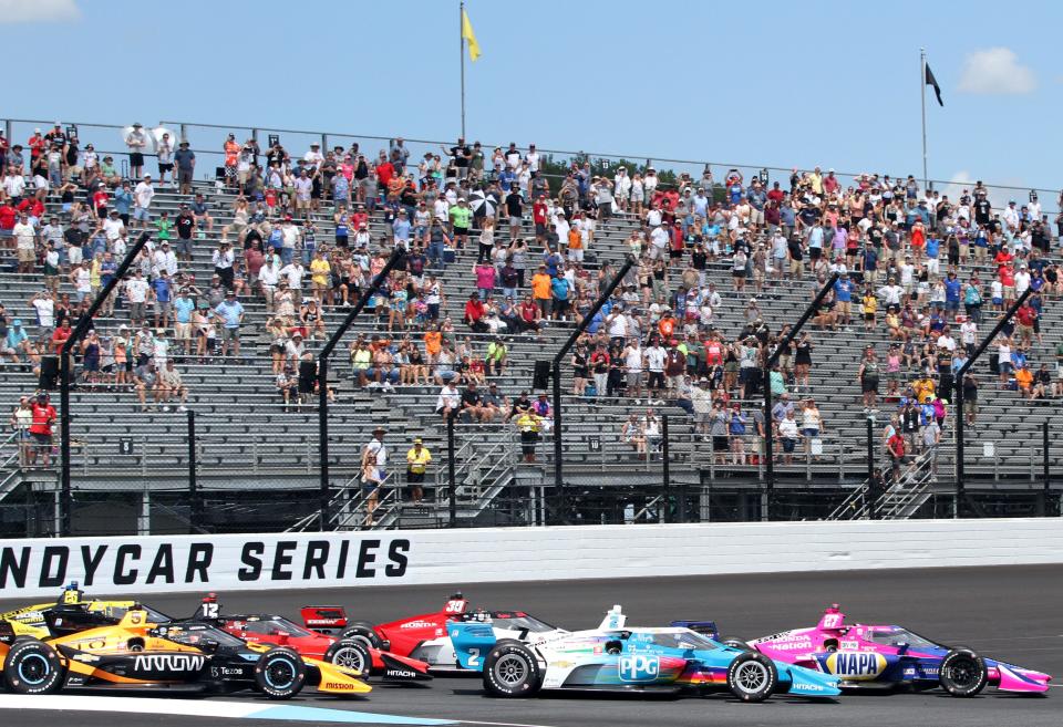Drivers enter the first turn Saturday, July 30, 2022, during the Gallagher Grand Prix at Indianapolis Motor Speedway.