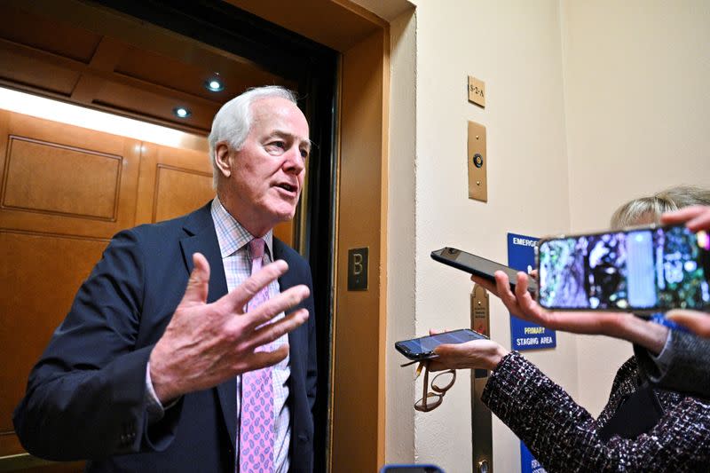 FILE PHOTO: U.S. Senator John Cornyn (R-TX) speaks with reporters at the U.S. Capitol in Washington