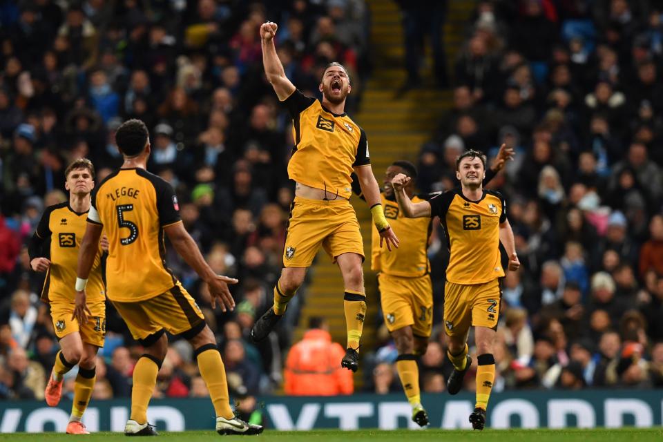 Tom Pope scored a memorable goal for Port Vale against Manchester City in the FA Cup. (Photo by PAUL ELLIS/AFP via Getty Images)