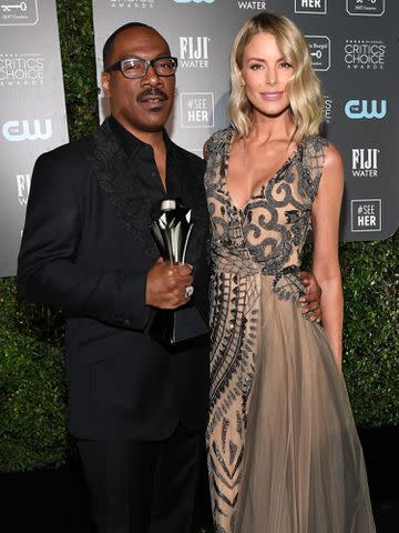 <p>Kevin Mazur/Getty</p> Eddie Murphy and Paige Butcher at the 25th Annual Critics' Choice Awards in January 2020 in Santa Monica, California