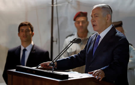 Israeli Prime Minister Benjamin Netanyahu speaks during the funeral of Zachary Baumel, a U.S.-born Israeli soldier missing since a 1982 tank battle against Syrian forces and whose remains were recently recovered by Israel, at the Mount Herzl military cemetery in Jerusalem April 4, 2019. REUTERS/Ronen Zvulun