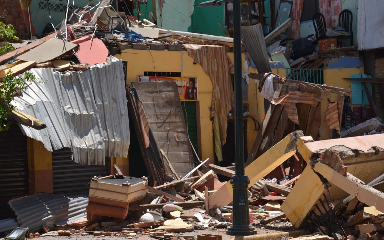 Destroyed buildings are seen after an earthquake in the city of Machala, Ecuador - Getty