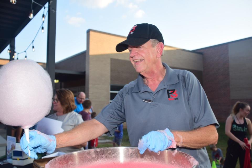 There will be cotton candy. At the 2019 Fall Carnival, Coach Jim Fetty from P3 Martial Arts keeps a smile on his face despite the endless line of kids.