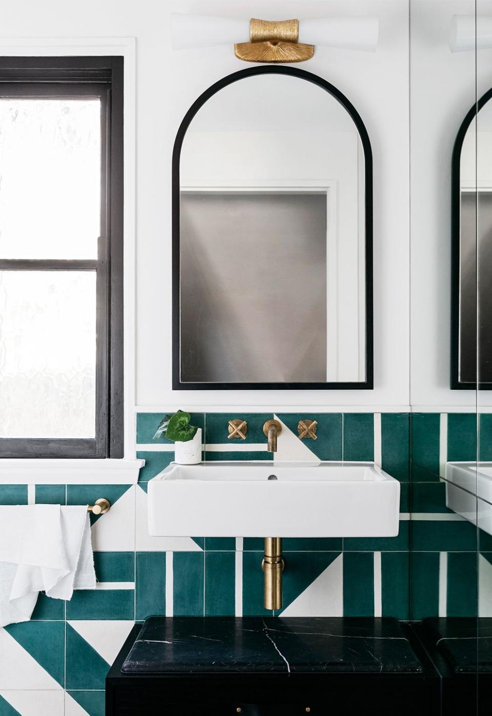 <p>A non-repeating tile pattern infuses this bathroom designed by Arent & Pyke with just a touch of visual interest. The colors and shapes ensure enough consistency without looking matchy-matchy or formulaic. </p>