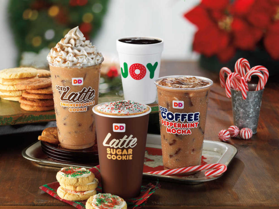 This undated product image provided by Dunkin' Donuts shows the chain's seasonal coffee drinks, from left, Snickerdoodle Latte, Sugar Cookie Latte, and Iced Peppermint Mocha coffee. Dunkin' Donuts is one of many businesses that roll out a number of limited-time flavors around the holidays.