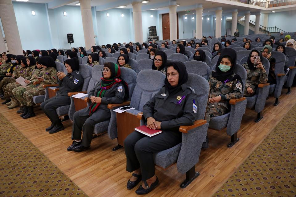 Afghan women police officers attend an event to mark International Women's Day in Kabul, Afghanistan, Sunday, March 7, 2021.