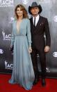 Musicians Faith Hill and Tim McGraw arrive at the 49th Annual Academy of Country Music Awards in Las Vegas, Nevada April 6, 2014. REUTERS/Steve Marcus (UNITED STATES - Tags: ENTERTAINMENT)(ACMAWARDS-ARRIVALS)