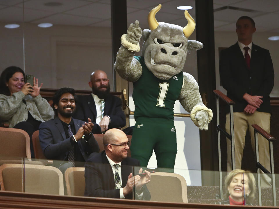 University of South Florida mascot Rocky the Bull is recognized in the Senate gallery as he watches the legislative process with some of his their students on Wednesday, Feb. 8, 2023, at the Capitol in Tallahassee, Fla. (AP Photo/Phil Sears)