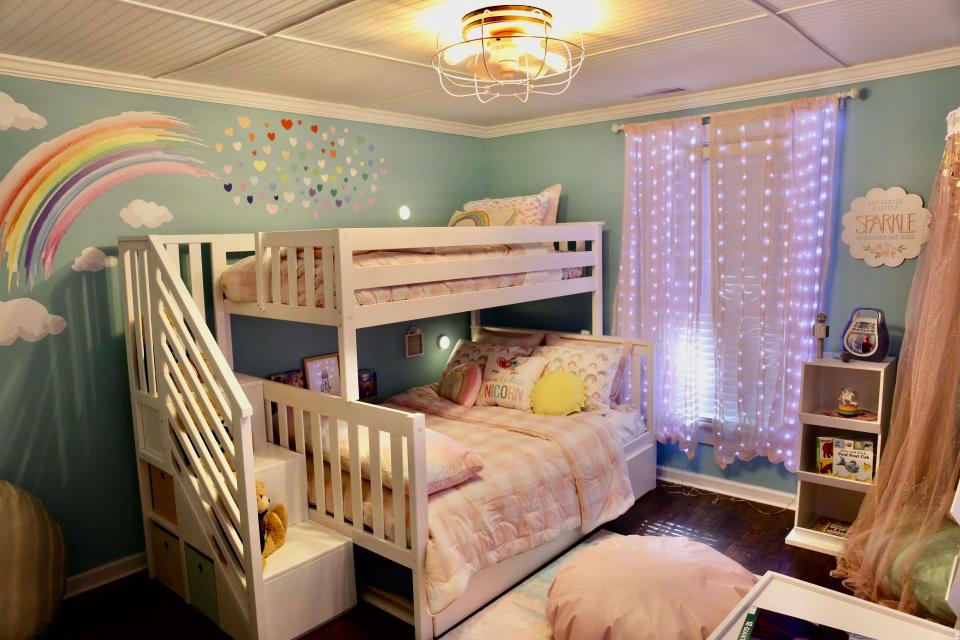 June Lanham, 5, needed a bedroom that was beautiful and functional to welcome her siblings as well. The bed has a trundle for little brother, designed by Amy Hensley, Knoxville director of Special Spaces. January 2023.