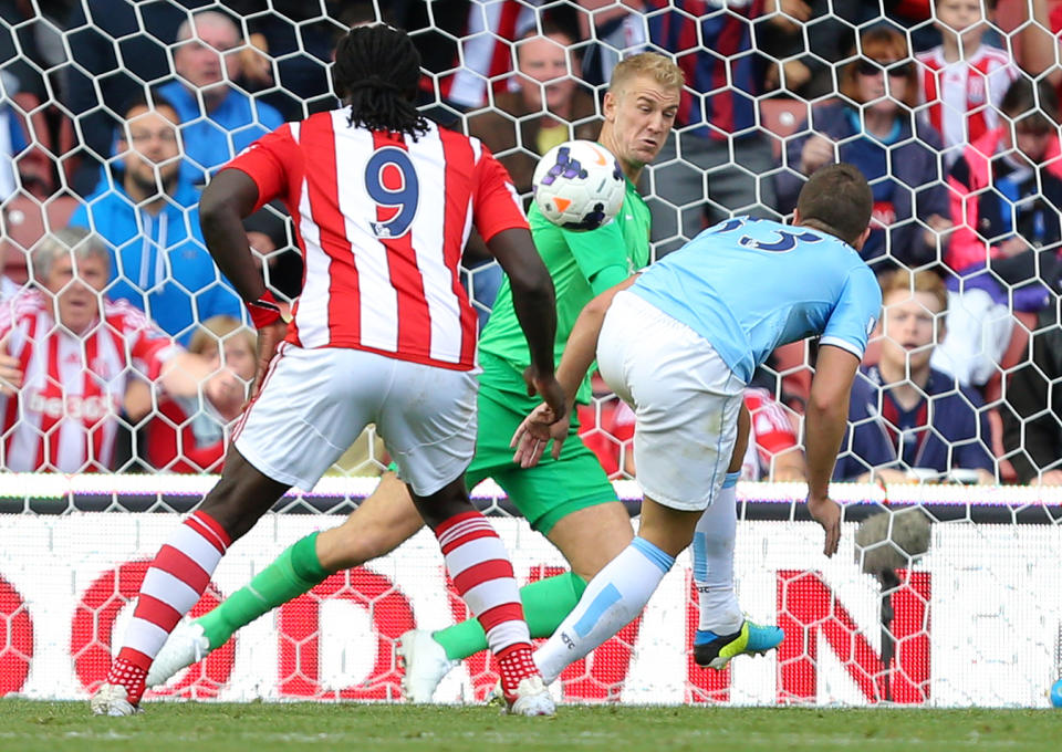 Manchester City's Joe Hart pulls off a point blank save during the Barclays Premier League match at the Britannia Stadium, Stoke On Trent.