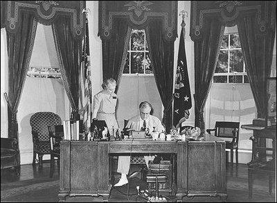 President Franklin Roosevelt meets with Marguerite Le Hand, his personal secretary.