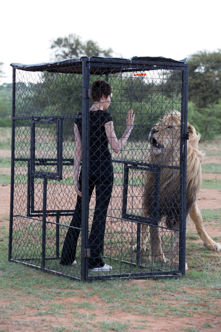 <p>In the image, Cara Delevingne is faced with the magnificence of the king of beasts who symbolises courage, and strength. She has a lion tattooed on her index finger, inspiring her and guiding her choices and actions. Source: David Yarrow/TAG </p>