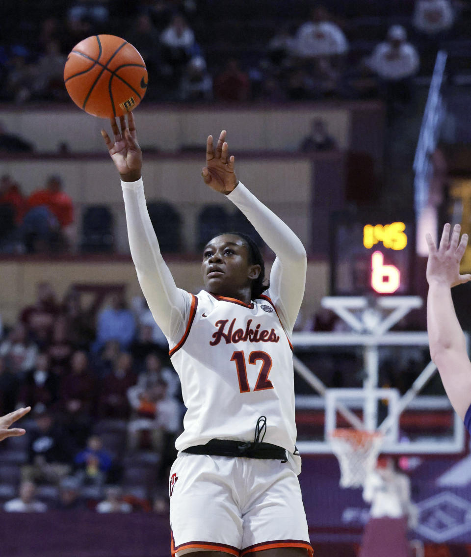 Virginia Tech's Samyha Suffren (12) shoots in the first half of an NCAA college basketball game against Clemson in Blacksburg, Va, Sunday, Jan. 21, 2024. (Matt Gentry/The Roanoke Times via AP)