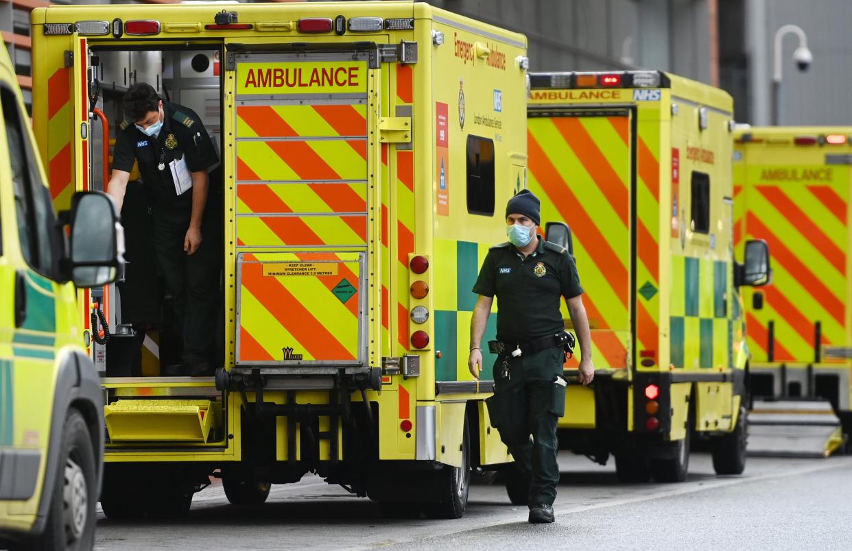 <p>Ambulances queue in February outside the Royal London Hospital, where long delays left patients waiting for hours</p> (EPA)