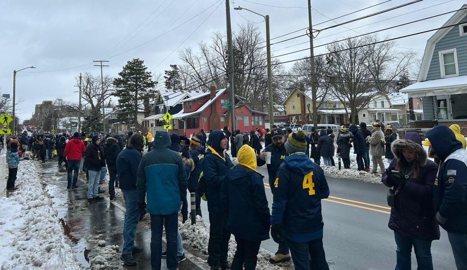 Fans line the streets for the start of the University of Michigan football parade in Ann Arbor on Saturday, Jan. 13, 2024.