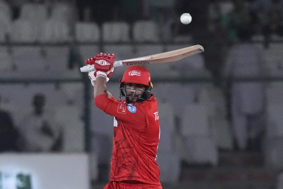 Islamabad United' Imad Wasim plays a shot during the Pakistan Super League T20 cricket eliminator match between Islamabad United and Peshawar Zalmi, in Karachi, Pakistan, Saturday, March 16, 2024. (AP Photo/Fareed Khan)