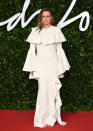 Alicia Silverstone went for oversized white ruffles to hit the red carpet [Photo: Getty]