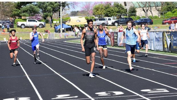 Christian Langlois is shown winning a KIL race this year. He went on to win the 100 and 200 at the state track meet.