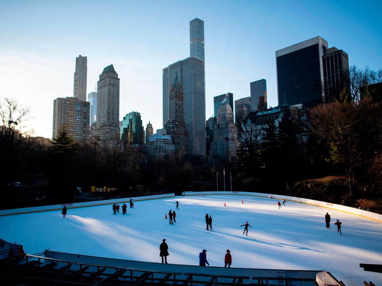 <p>People skate on the Wollman Rink in Central Park in the early morning hours of  27 January 2019 in New York City</p> ((AFP via Getty Images))