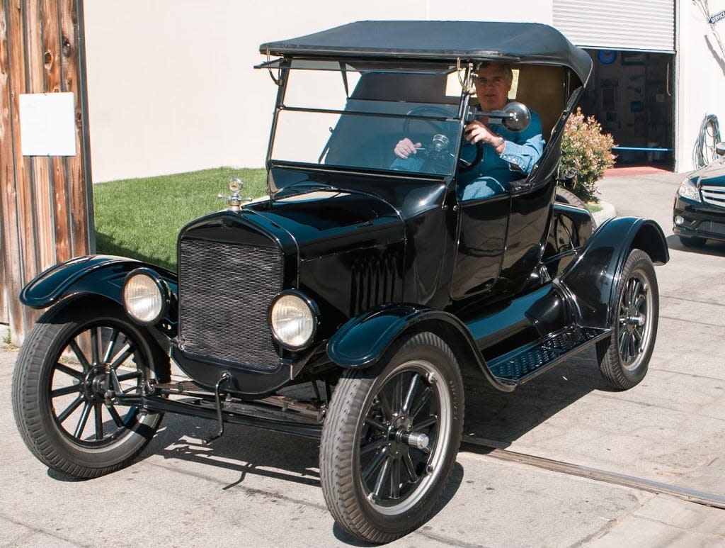 Car collector and comedian Jay Leno drives his 1927 Model T a few months ago.