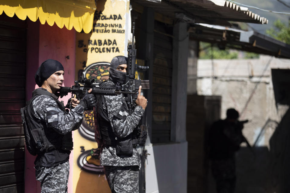 Police conduct an operation against alleged drug traffickers in the Jacarezinho favela of Rio de Janeiro, Brazil, Thursday, May 6, 2021. (AP Photo/Silvia Izquierdo)