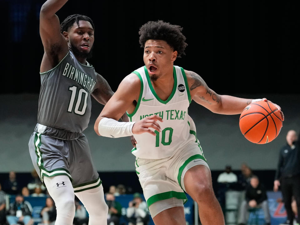 North Texas guard Kai Huntsberry (10) drives to the basket past UAB's Jordan Walker (10) during a game. (Chris Jones-USA TODAY Sports)