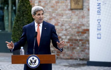 U.S. Secretary of State John Kerry talks to journalists in front of Palais Coburg, the hotel where the Iran nuclear talks meetings are being held in Vienna, Austria July 9, 2015. REUTERS/Leonhard Foeger