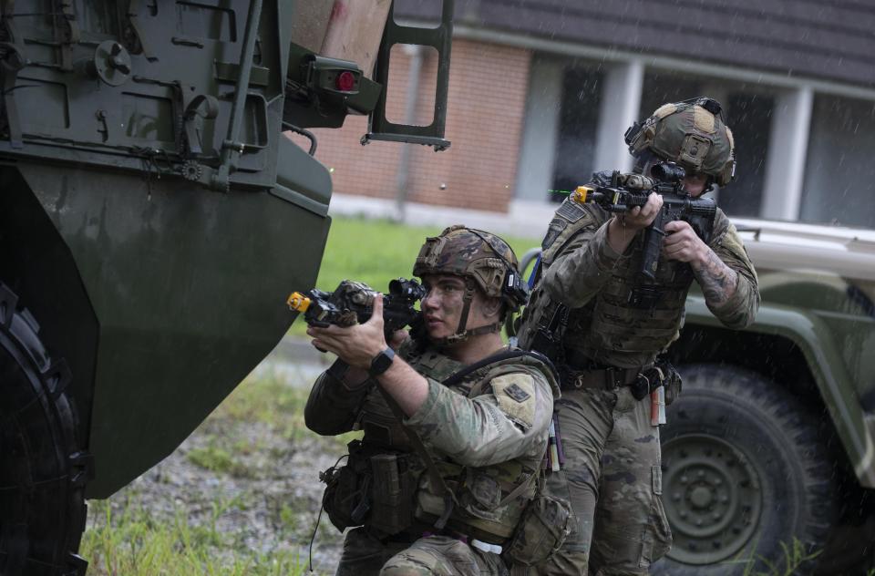 U.S. soldiers from 2nd Infantry Division, participate in a UFS/TIGER Combined Urban Operations plan as part of Ulchi Freedom Shield (UFS) exercises at Wollong Urban Area Operatiions training center, Wednesday, Aug. 23, 2023 on Paju in Gyeonggi-do, South Korea. (Jeon Heion-Kyun/EPA via AP, Pool)