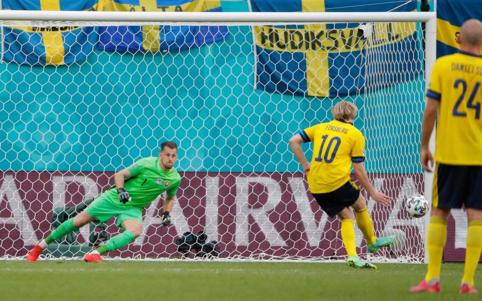Emil Forsberg scores a penalty during the UEFA EURO 2020 Group E football match between Sweden and Slovakia at Saint Petersburg Stadium in Saint Petersburg on June 18, 2021. - GETTY IMAGES