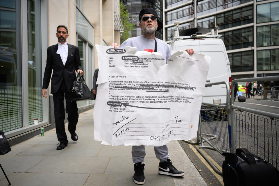 Brian Harvey, a former member of boyband East 17, protests about his own hacking case as Prince Harry, Duke of Sussex, gives evidence at the Mirror Group Phone hacking trial at the Rolls Building at High Court on June 07, 2023 in London, England. Prince Harry is one of several claimants in a lawsuit against Mirror Group Newspapers related to allegations of unlawful information gathering in previous decades. (Photo by Leon Neal/Getty Images)