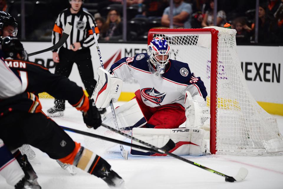 Apr 17, 2022; Anaheim, California, USA; Columbus Blue Jackets goaltender J-F Berube (30) defends the goal against the Anaheim Ducks during the second period at Honda Center. Mandatory Credit: Gary A. Vasquez-USA TODAY Sports