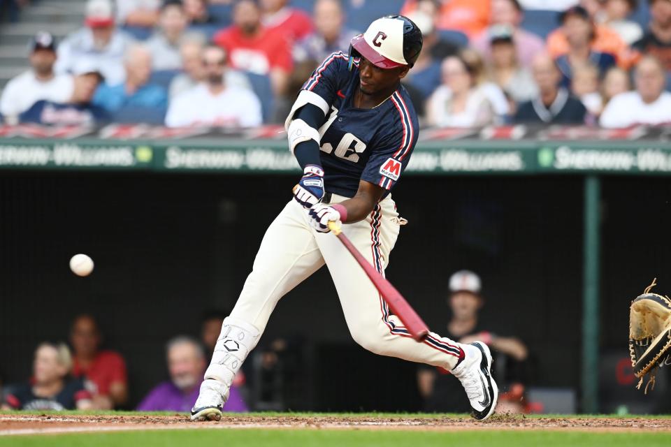 Cleveland Guardians center fielder Angel Martinez (1) hits a two-run home run against the Baltimore Orioles on Saturday in Cleveland.