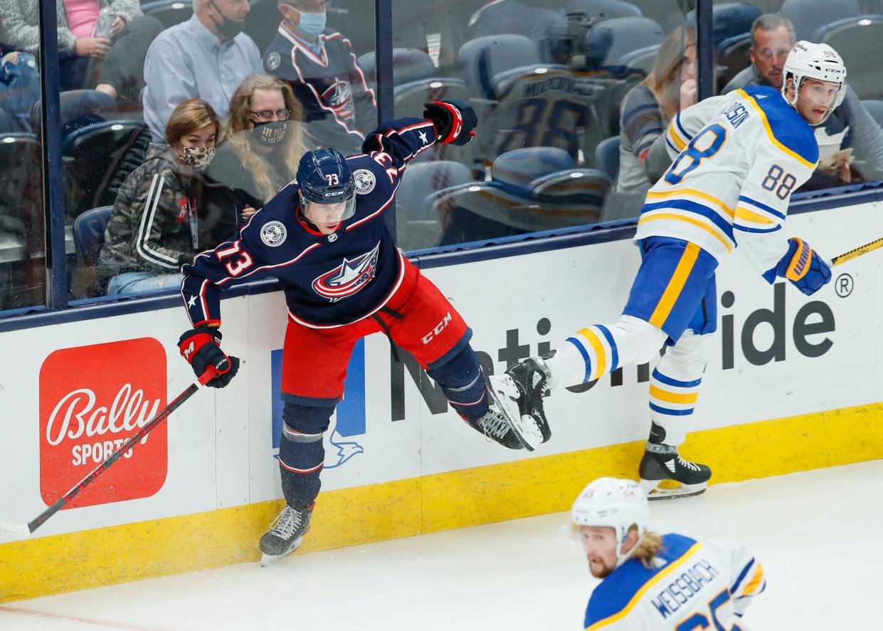 Columbus Blue Jackets center James Malatesta (73) collides with Buffalo Sabres defenseman Brandon Davidson (88) during the second period of the NHL preseason hockey game at Nationwide Arena in Columbus on Tuesday, Sept. 28, 2021. 