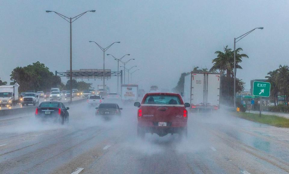 Cars head west under heavy rain on the Palmetto Expressway in North Miami as a severe weather alert was issued by the National Weather Service for more rainfall and potential flooding that began around 8 a.m. Friday morning, March 22, 2024, and is expected to continue into Saturday. Also the first two days of the three-day 2024 Ultra Music Festival in downtown Miami’s Bayfront Park.