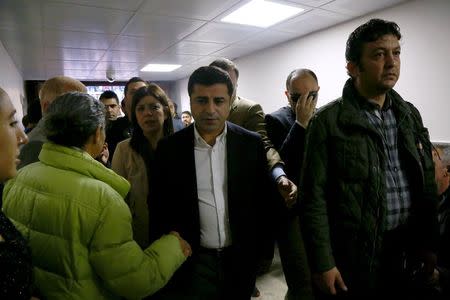 Selahattin Demirtas, co-chairman of the pro-Kurdish Peoples' Democratic Party (HDP), arrives a hospital morgue where killed Bar Association President Tahir Elci is brought for an autopsy in Kurdish dominated southeastern city of Diyarbakir, Turkey, November 28, 2015. REUTERS/Sertac Kayar